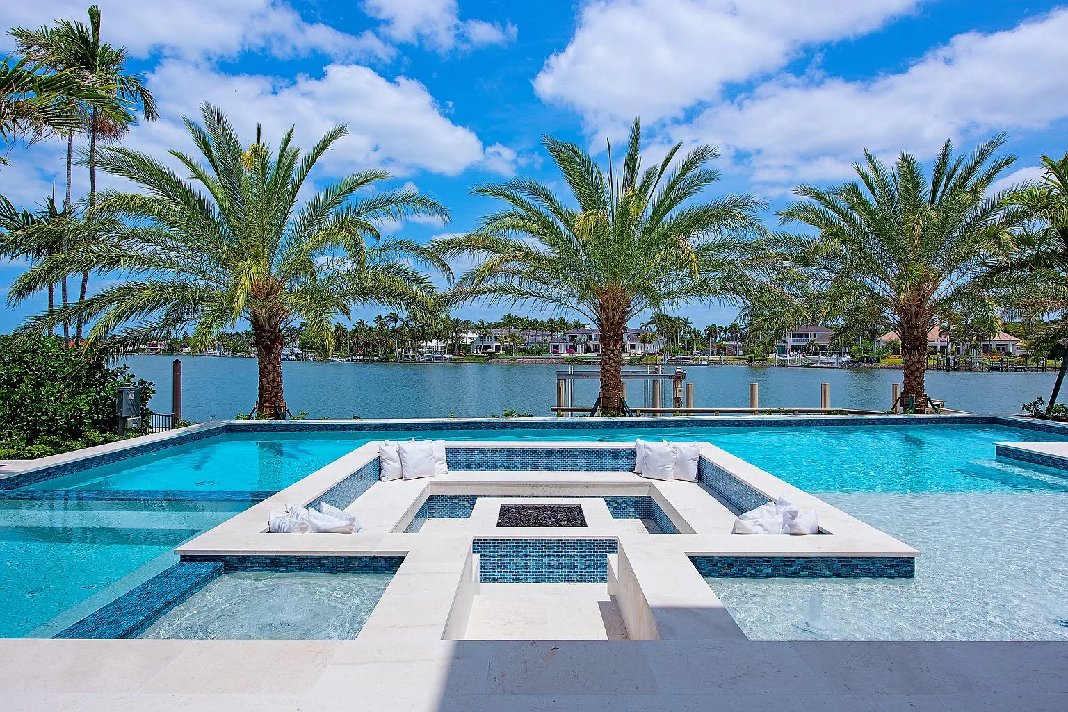 Sunken fire lounge within the pool